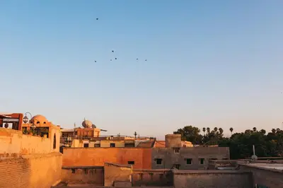 a view of roofs of buildings in a city at Riad Siena II in Marrakech