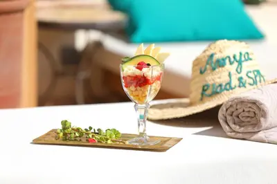 a dessert in a glass on a plate on a table at Riad Amya & Spa in Marrakech