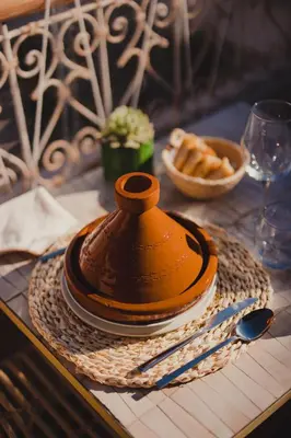 a plate of food sitting on top of a table at Riad Tizou in Marrakech