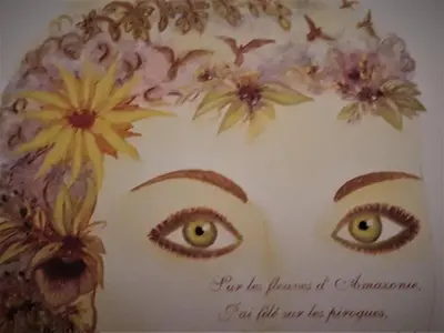 a cake with eyes and flowers on top of it at Riad Jnane d'Ô in Marrakech