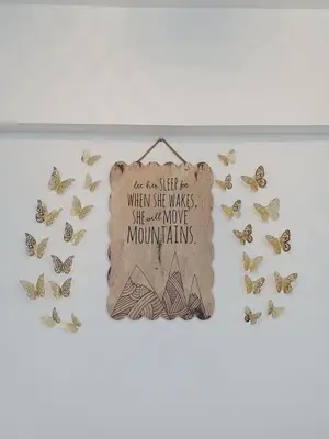 a butterfly banner with a sign that says we loved her when she washes at Deluxe Apartment in Marrakesh. hevernage flat in Marrakech