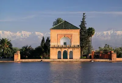 a building in the middle of a body of water at Bonheur Partagé 1 in Marrakech