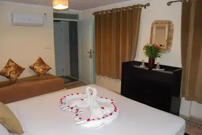 a room with a table with a cake on it at Dar 