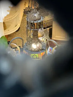 a close up of a chandelier in a kitchen at Riad dar Rbati in Marrakech
