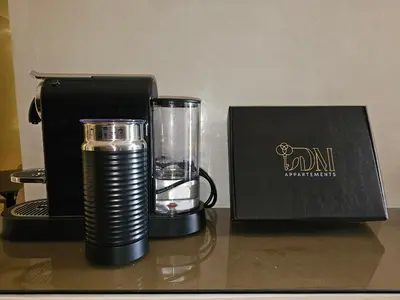 a blender sitting next to a box on a table at LDM Appartements Marrakech in Marrakech