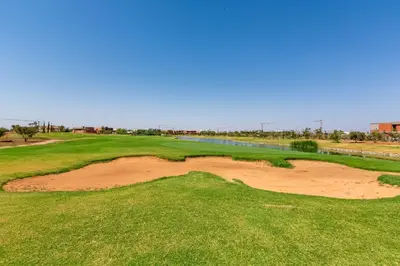 an overhead view of the green at a golf course at Villa Nounja Golf Amelkis Marrakech in Marrakech