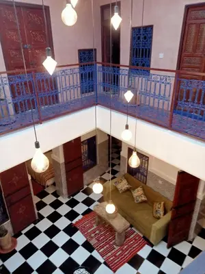 an overhead view of a living room with a couch at Riad l Ayinn in the heart of Marrakech. in Marrakech