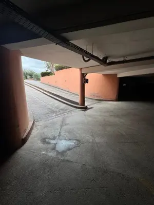 an empty parking lot in a parking garage at Al ATLAS résidence in Marrakech