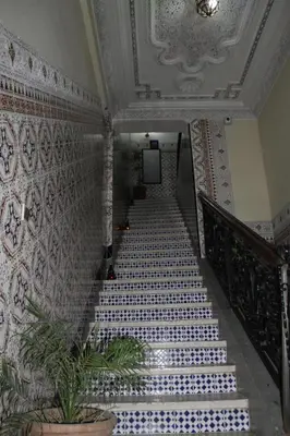 a hallway with a staircase in a building at Riad Marrakech Medina in Marrakech