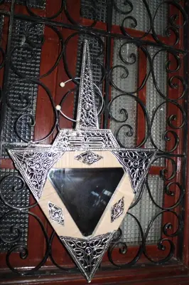 a metal door with a star on it at Riad Marrakech Medina in Marrakech