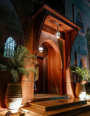 a lobby with a potted plant in a building at Villa Taj Sofia & Spa in Marrakech