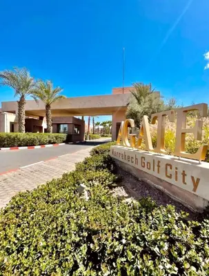 a sign for the entrance to a student golf city at Appartement de luxe prestigia Golf Resort in Marrakech