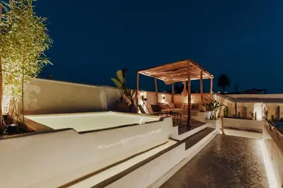 a bath tub sitting on the side of a building at Kenzara Suites & Pool, Your private escape in Marrakech