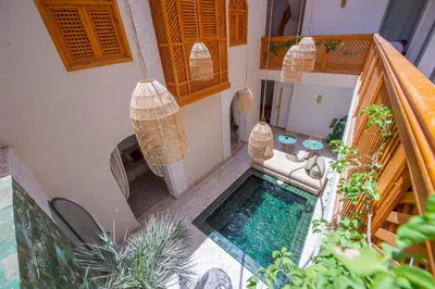 an overhead view of a swimming pool in a house at RIAD DAR BAYANE in Marrakech
