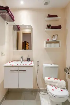 a bathroom with a toilet and a sink at Coquet studio pour vacance in Marrakech