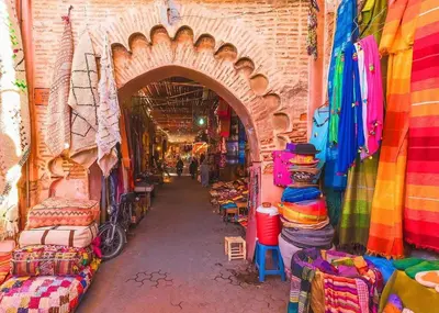 an alley way in a store with colorful merchandise at Sunset Marrakech in Marrakech