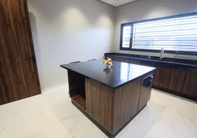 a kitchen with a large island with a counter top at Vista de La Palma in Marrakech
