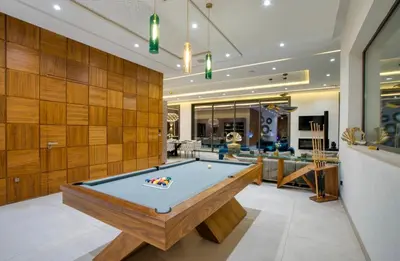 a billiard room with a pool table at Villa Simeon Marrakech in Marrakech