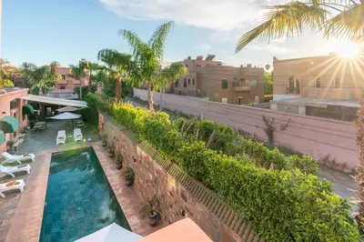 an overhead view of a swimming pool on a building at Yanis Guest House in Marrakech