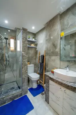 a bathroom with a toilet and a sink and a shower at NEW ! Unique Equipped Flat in the Heart of Marrakech in Marrakech