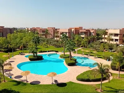 an overhead view of a swimming pool in a resort at Appartement de luxe Prestigia Opale in Marrakech