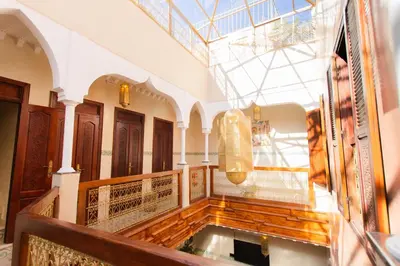 a room with a pool in the middle of a building at RIAD MARRAKECH DOORS in Marrakech