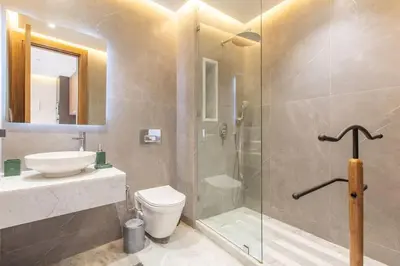 a bathroom with a shower and a sink and a toilet at New ! Stunning and Comfortable apartement in Marrakech