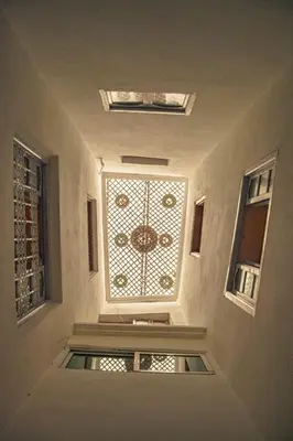 a room with a window in a building at Riad Fz Marrakech in Marrakech