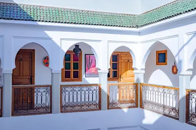 a room with a balcony in a house at SABOR SAFRA in Marrakech