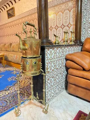 a living room with a couch and a table at Marrakech aRt in Marrakech