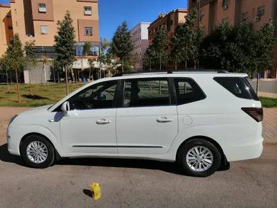 a white car parked in a parking lot at Appartement funny house a place jamaa el fna de marrakech in Marrakech