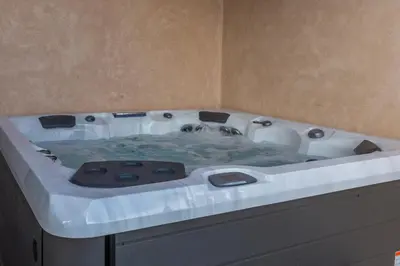 a bath tub in a room with at VILLA 103 - Luxury Getaway - Private Jacuzzi in Marrakech