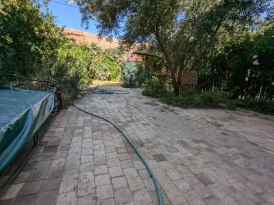 a hose is attached to a brickickedickedavementavement at Dar saafia in Marrakech