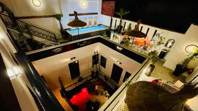 an overhead view of a house with a swimming pool at Dar Najat in Marrakech