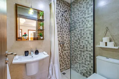a bathroom with a sink and a shower at favorite in the city center - 100% Equipped in Marrakech