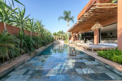 an image of a swimming pool in a villa at Villa Ecolodge DAR LOUMA in Marrakech