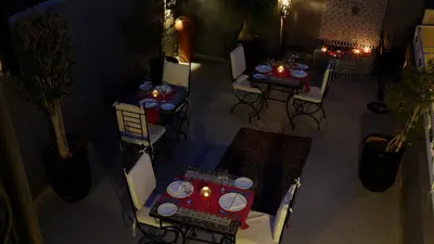 an overhead view of a table and chairs in a room at Riad Nafis in Marrakech