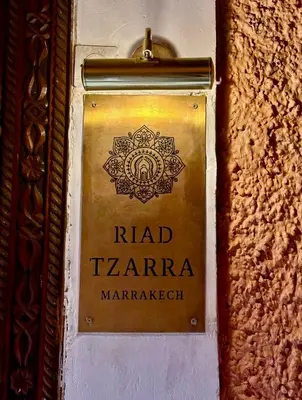a sign for at Riad Tzarra in Marrakech