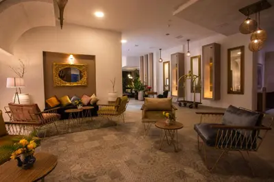 a large living room with couches and chairs and tables at Dellarosa Boutique Hotel and Spa in Marrakech