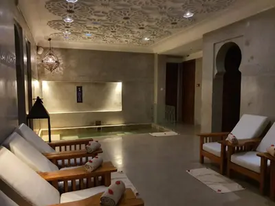a living room with couches and chairs in a room at Riad Dar Justo Hotel Boutique & Spa in Marrakech