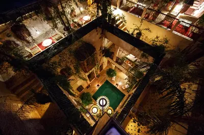 an overhead view of a building with a clock at Riad Dar Justo Hotel Boutique & Spa in Marrakech