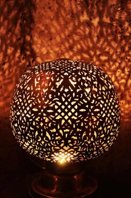 a black and white lamp sitting on a table at Riad Carina in Marrakech