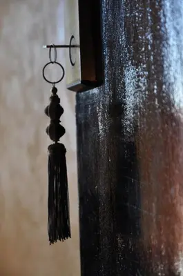 a tassel hanging from the side of a wall at Mont Gueliz in Marrakech