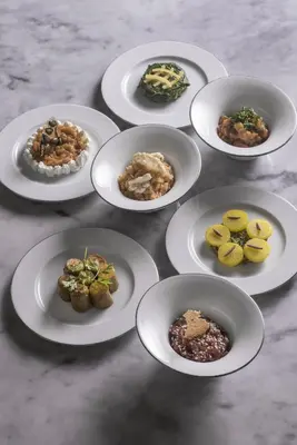 a group of plates of food on a table at La Sultana Marrakech in Marrakech