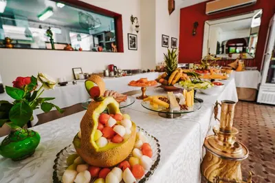 a buffet of food on a table in a restaurant at Les Borjs De La Kasbah in Marrakech