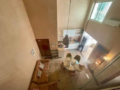 an overhead view of a kitchen with a table at Au Riad des Deux Patios - Marrakech in Marrakech
