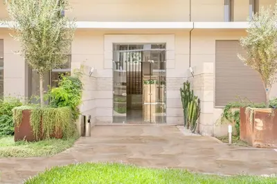 a building with a glass door in front of it at Garden Marrakech Luxury in Marrakech