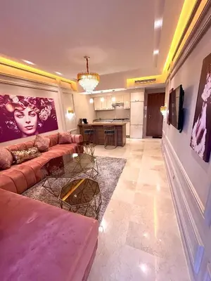 a living room with a couch and a table at Garden Marrakech Luxury in Marrakech