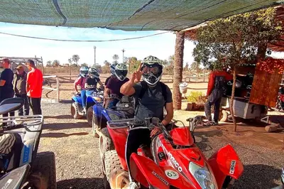 a group of people on motorcycles parked under a tent at Oasis appart sérénité in Marrakech